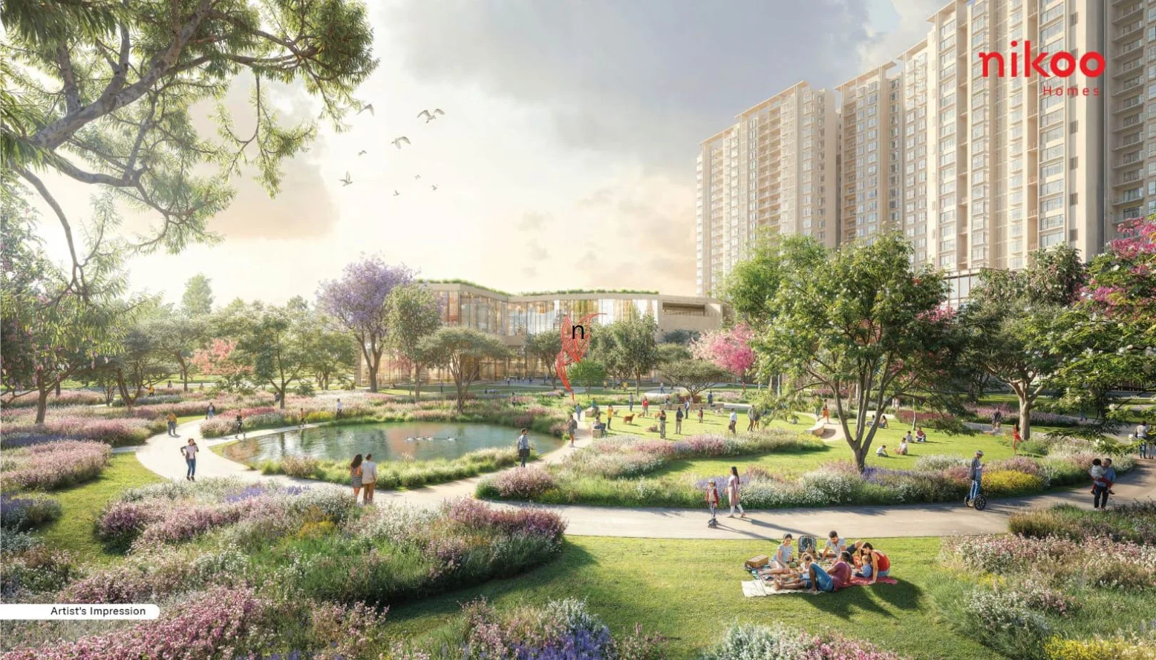 Nikoo Homes 7 clubhouse with co-working zones, gym, pools, indoor games, and outdoor courts in Bhartiya Garden Estate.